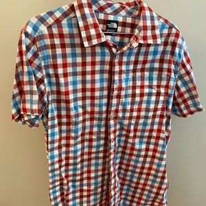 The North Face red, white, and blue checkered short sleeve button down